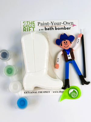 Paint Your Own Unicorn Bath Bomb Set, including a bendable blue cowboy toy.